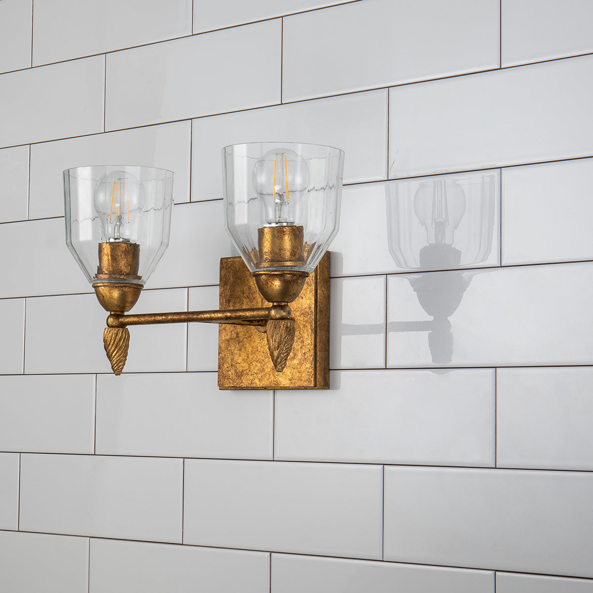 Gilded Nola Felice koupelnová lampa 2 světla čiré sklo