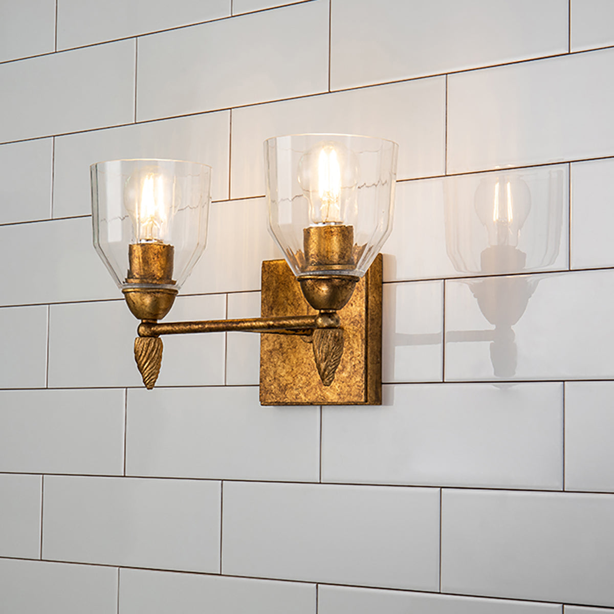 Gilded Nola Felice koupelnová lampa 2 světla čiré sklo